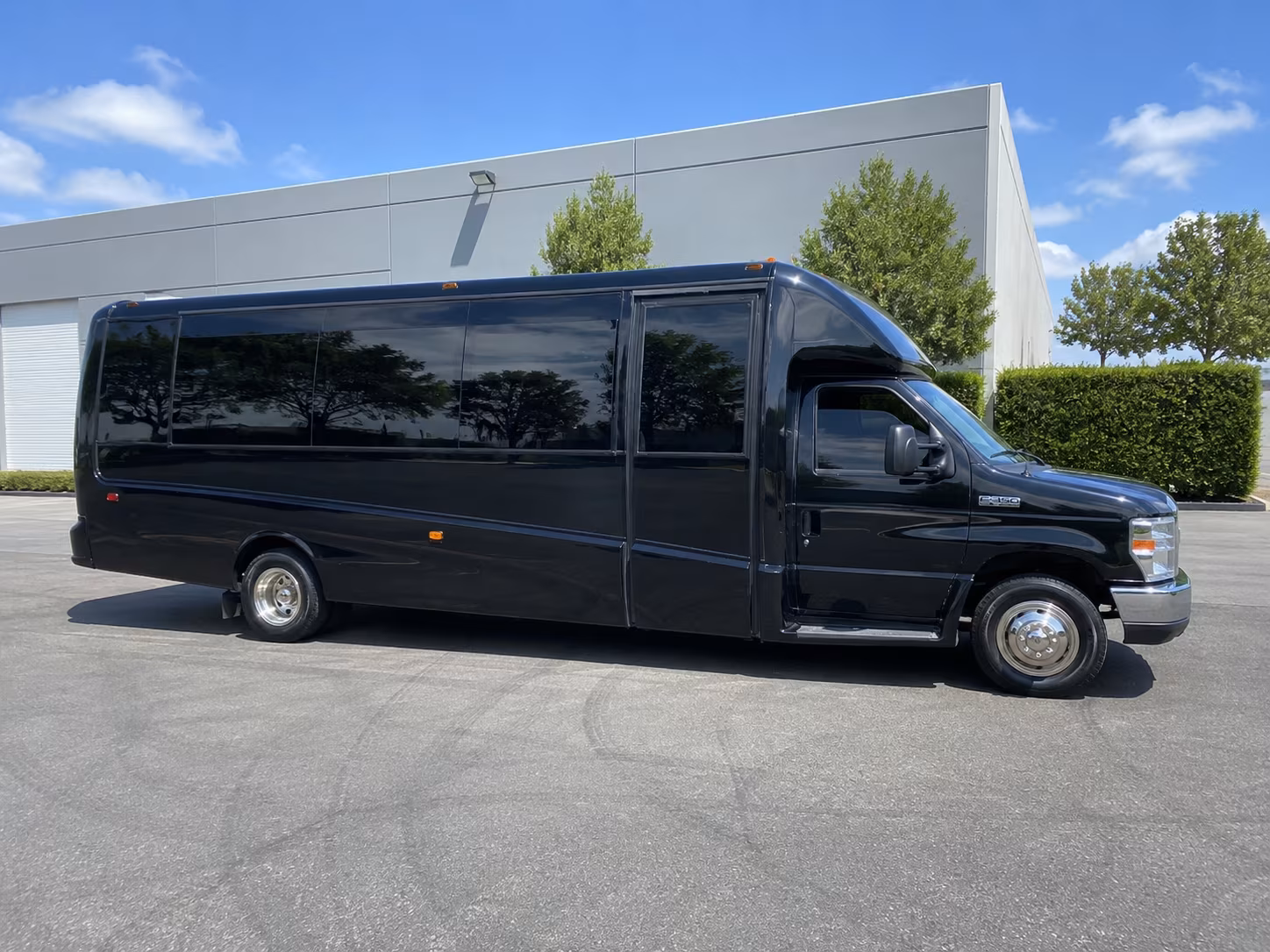 Columbus Birthday, Sweet 16, & Quinceañera Transportation party bus exterior